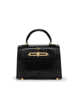 Black handbag with gold accents on a white background