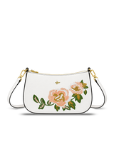 White handbag with floral embroidery on a white background