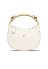 White handbag with gold handle on a white background